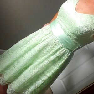 Green cocktail length dress